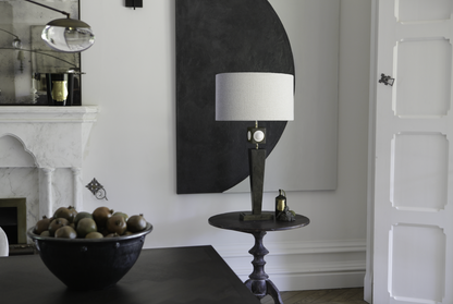 tall black table lamp in a dining room