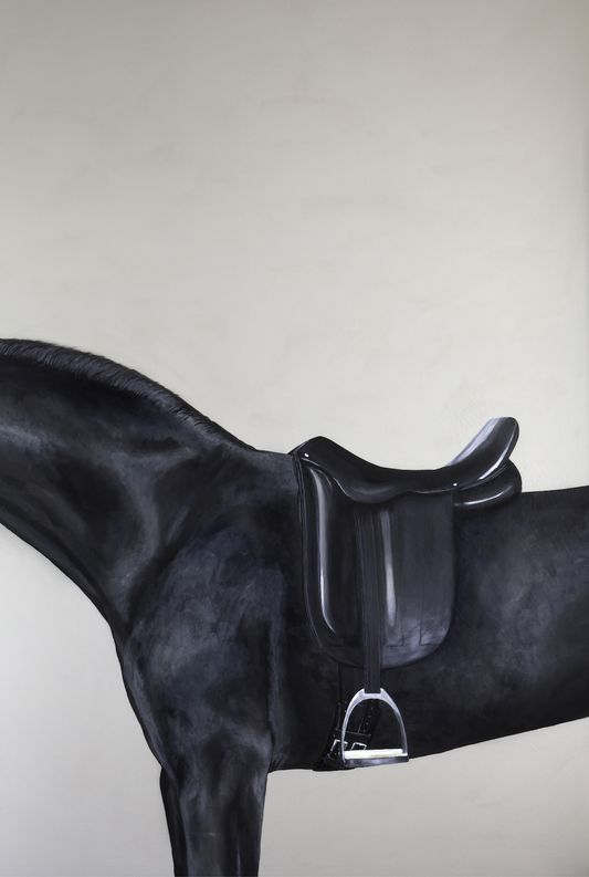 black horse in an Hermes saddle