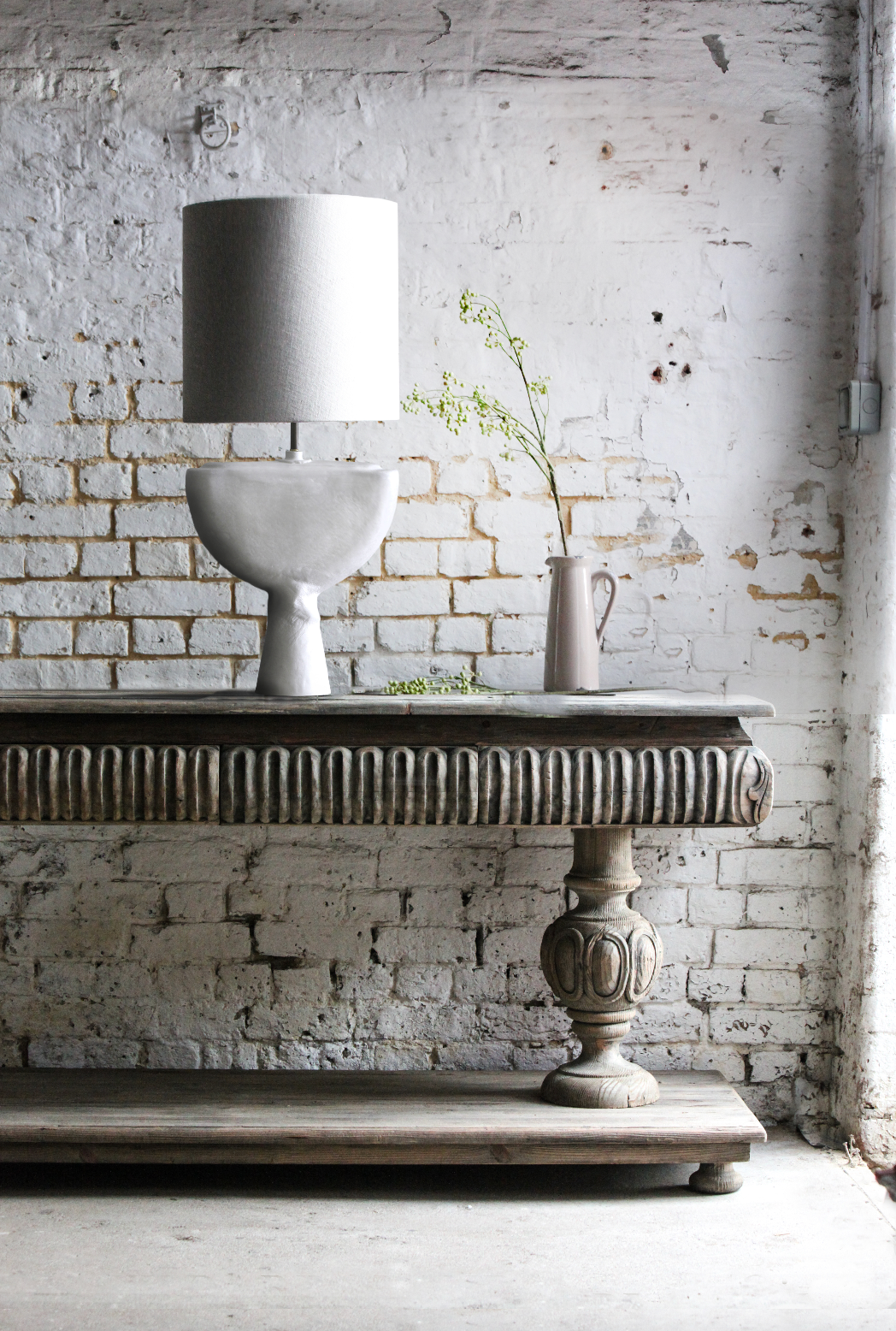 table lamp on rustic console table 